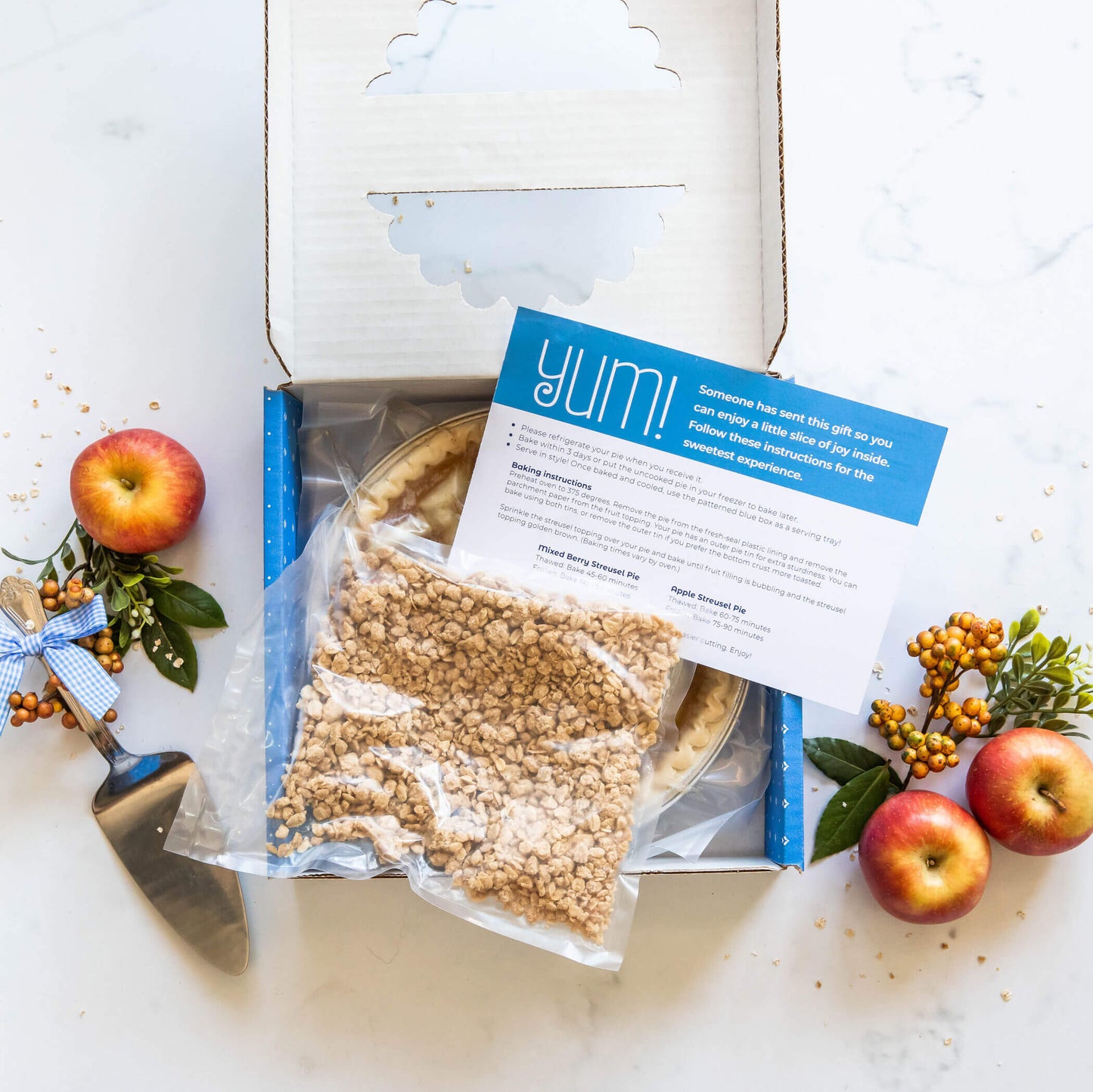 A Blue Ribbon apple streusel pie in the box